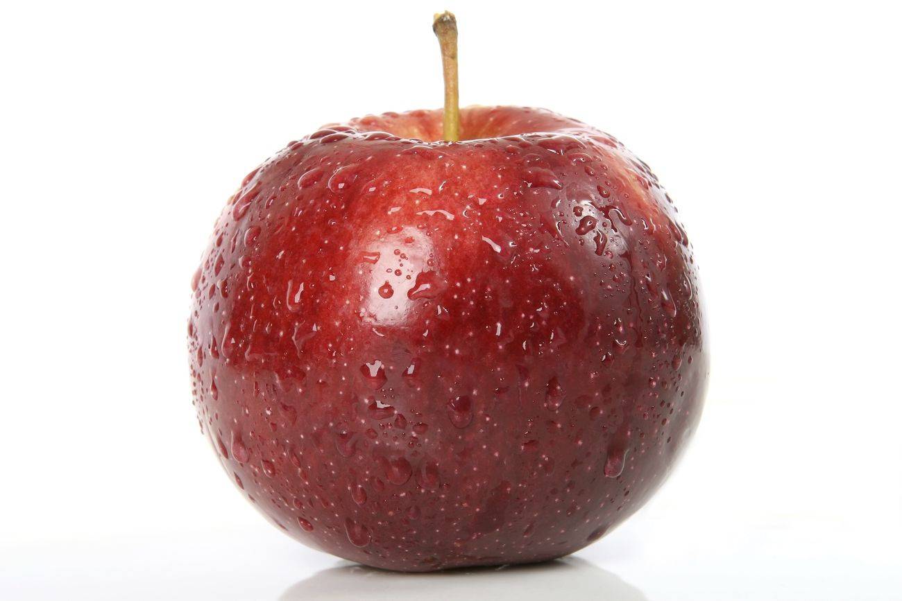 Closeup on red apple on white